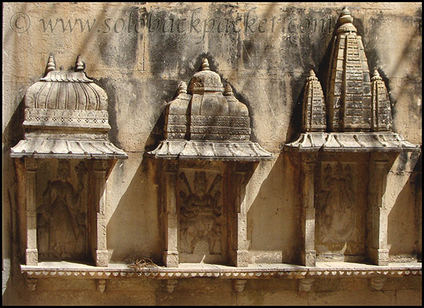 Small temples on the wall of Raniji ki Baori