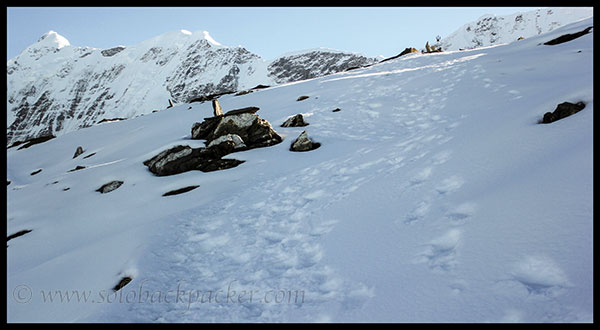 Snow-covered trail from Roopkund to Junargali