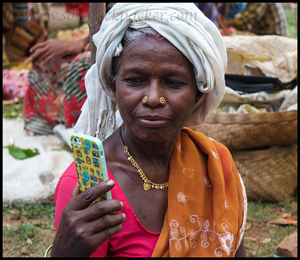 Tryst With The Technology: A Local Woman Checking The iPhone