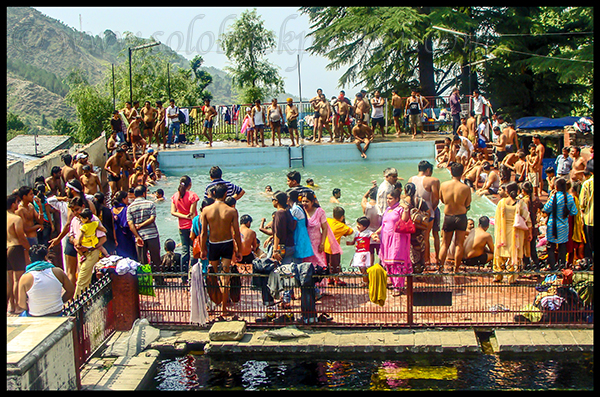 Tourists Bathing In Front of Bhagsu Nag Temple