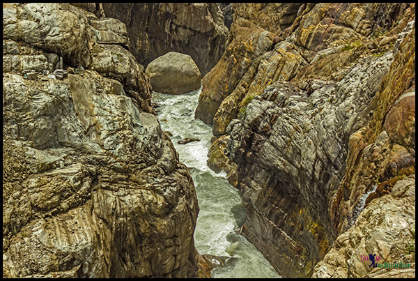 Massive Stone Walls of Mandakini Gorge Near Rambara