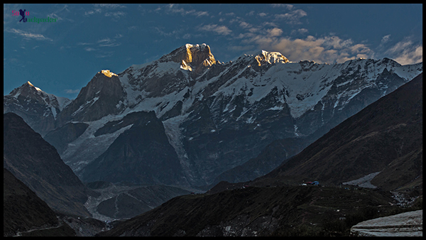 First Rays of The Sun Over The Mountains