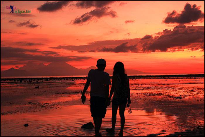 A Couple Enjoying Sunset at Sunset Beach