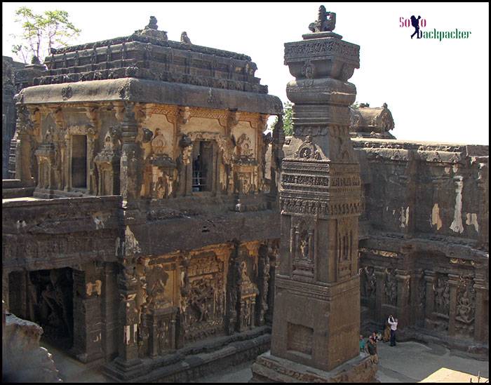 View of Kailasa Temple and a Carved Pillar