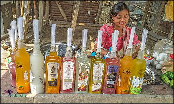 A woman selling home-made beer